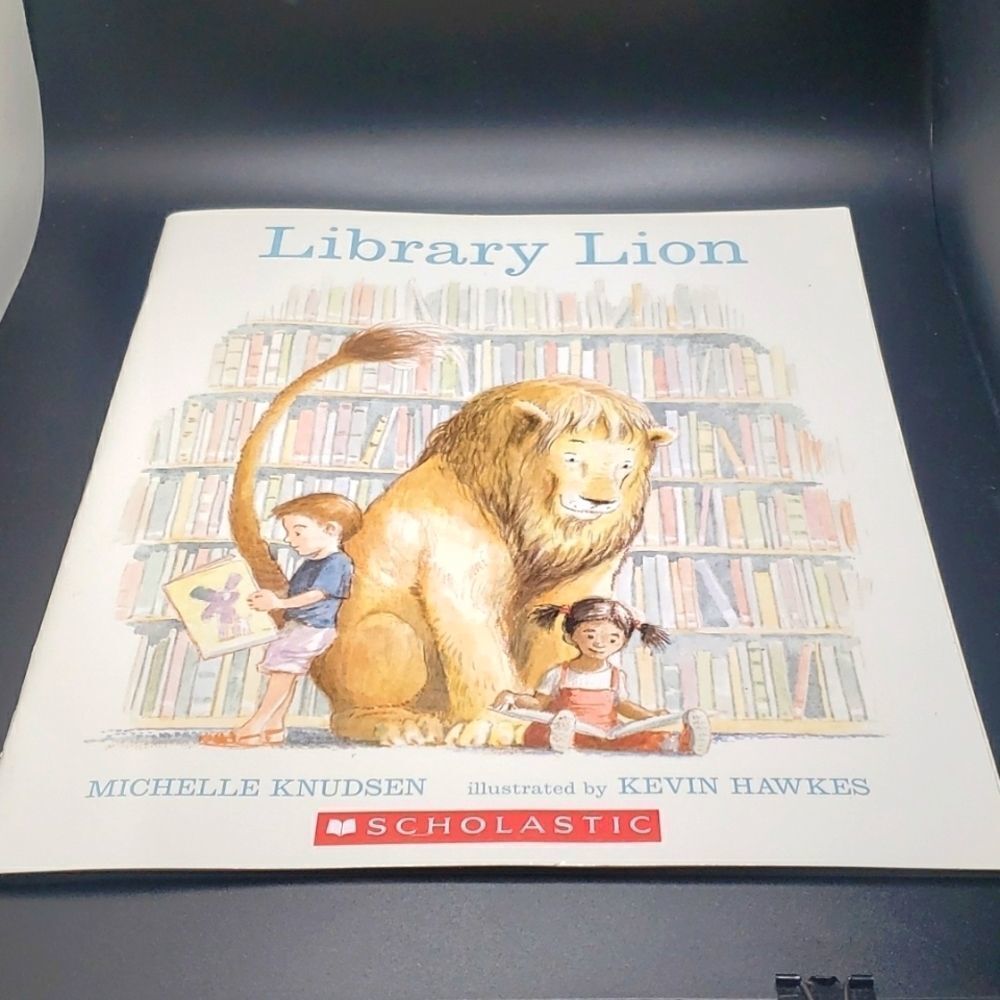 THE Library lion softcover book